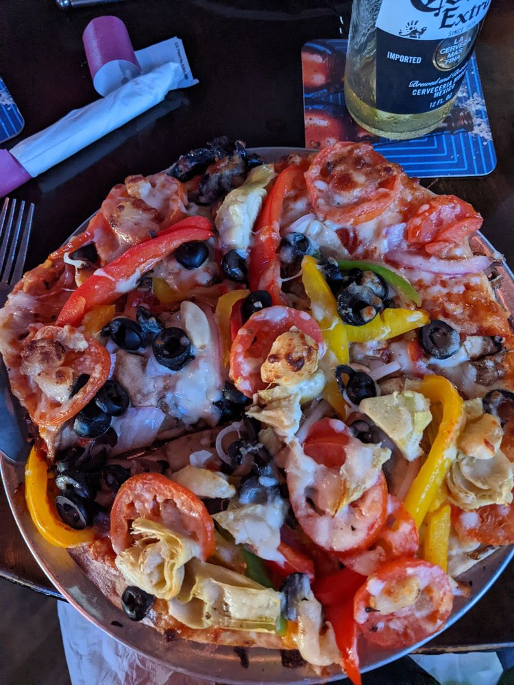 A loaded vegetable pizza served at Casablanca